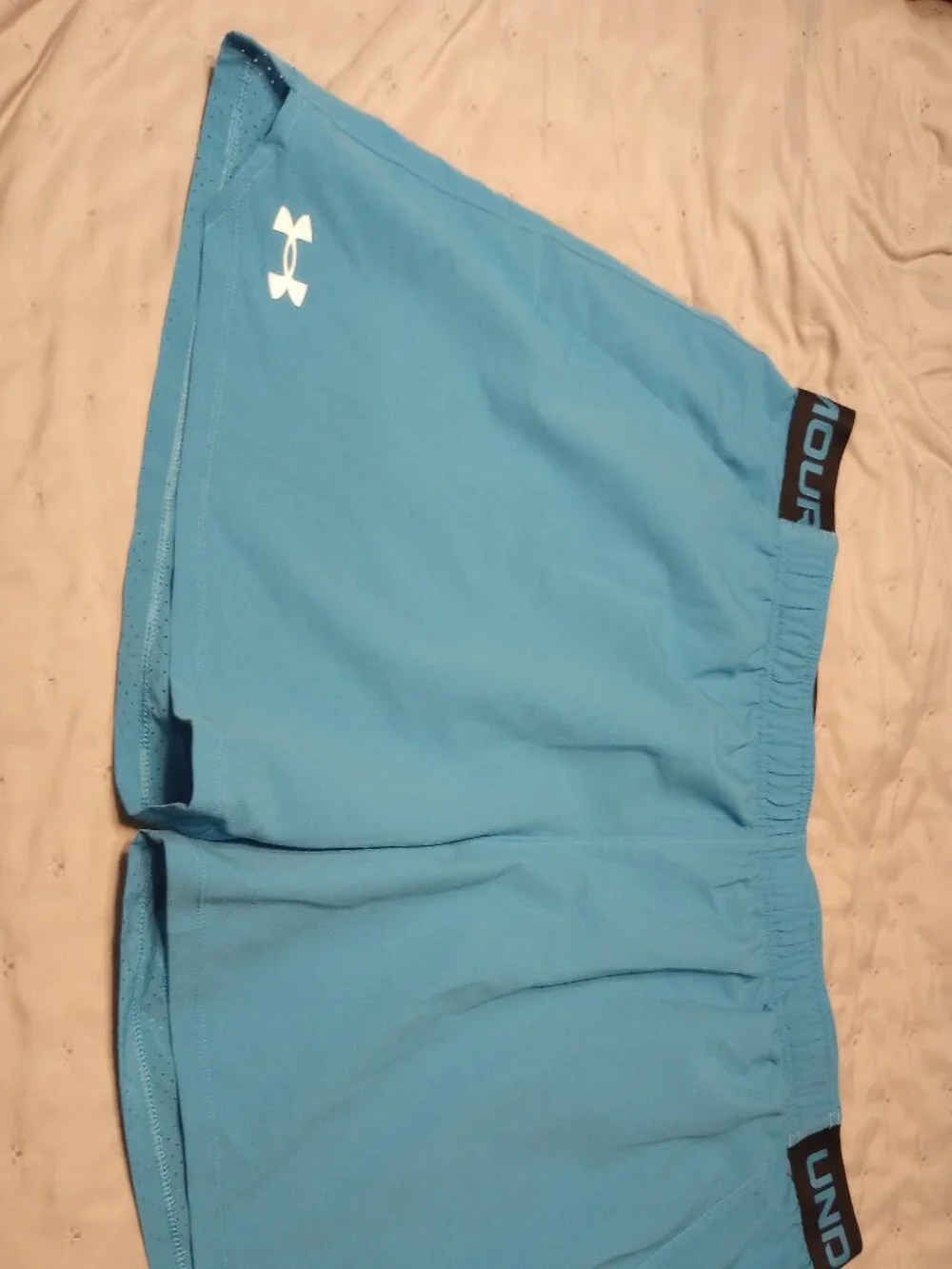 Under Armour blue athletic shorts (NWOT)